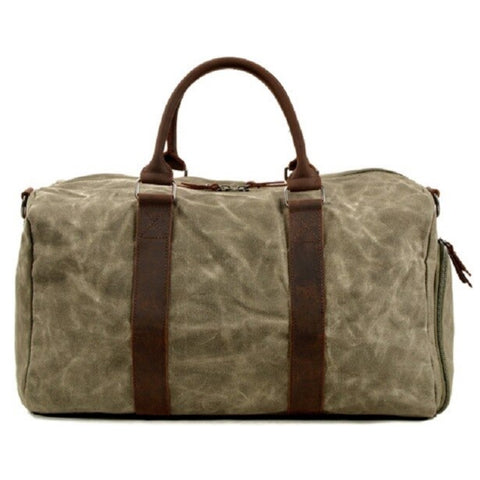Sac de voyage bandoulière en cuir et toile