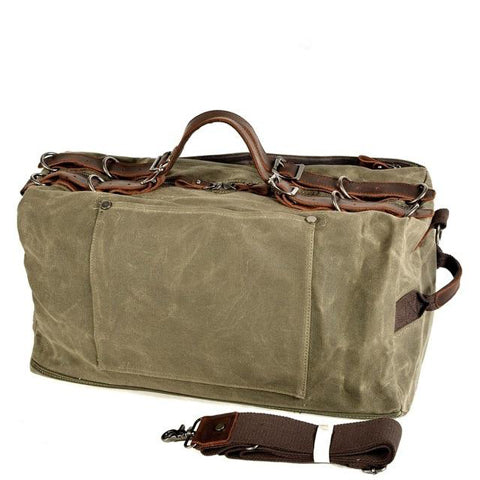 Sac de voyage bandoulière en cuir et toile