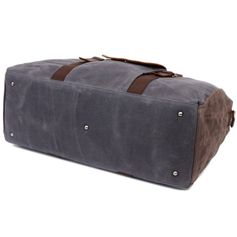 Sac cuir et toile étanche pour voyageur