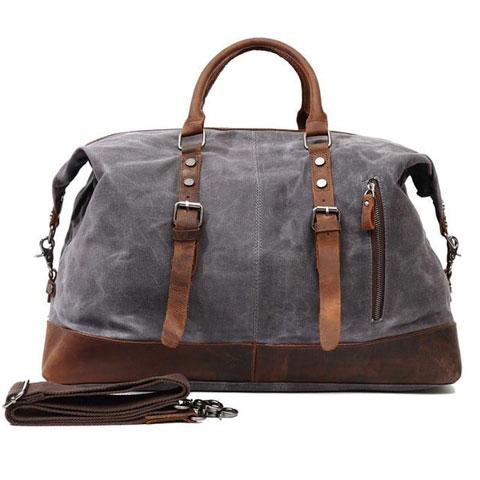 Sac de voyage bandoulière en cuir et toile